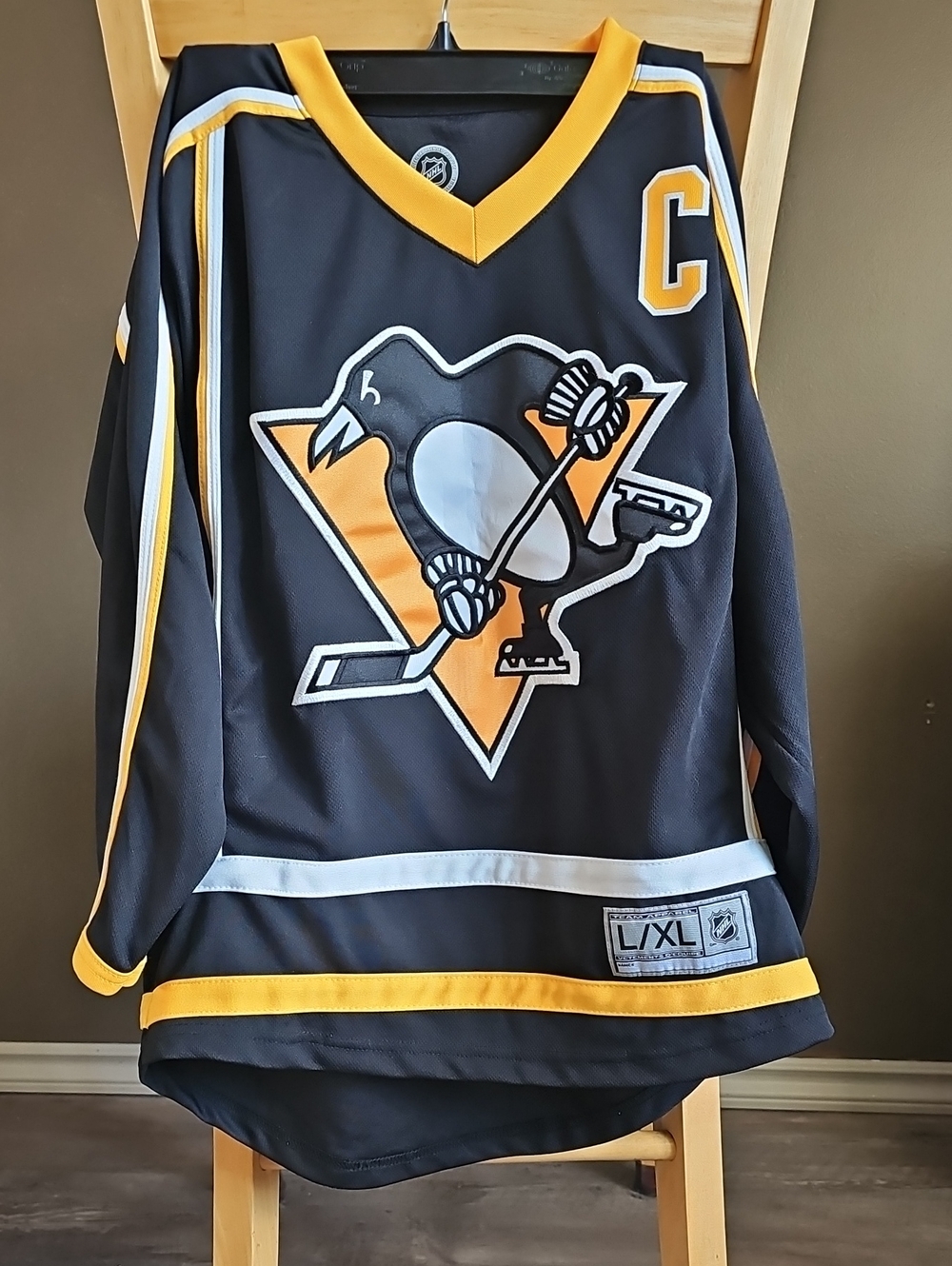 NHL Official Licensed Product Patch on Black and Gold Fabric